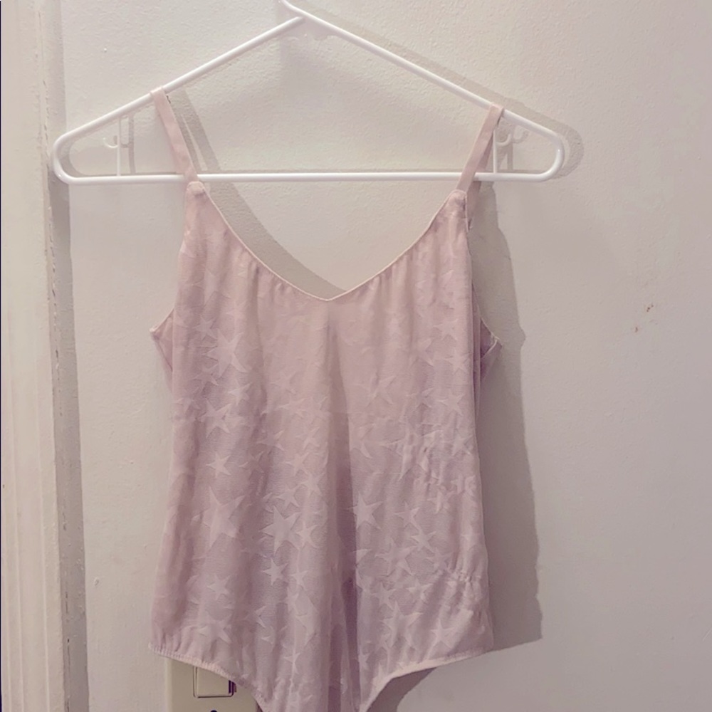 Pink mesh body suit